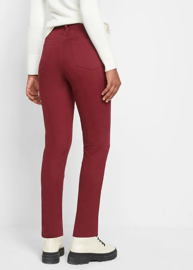 Pantalón elástico de corte slim rojo avellana